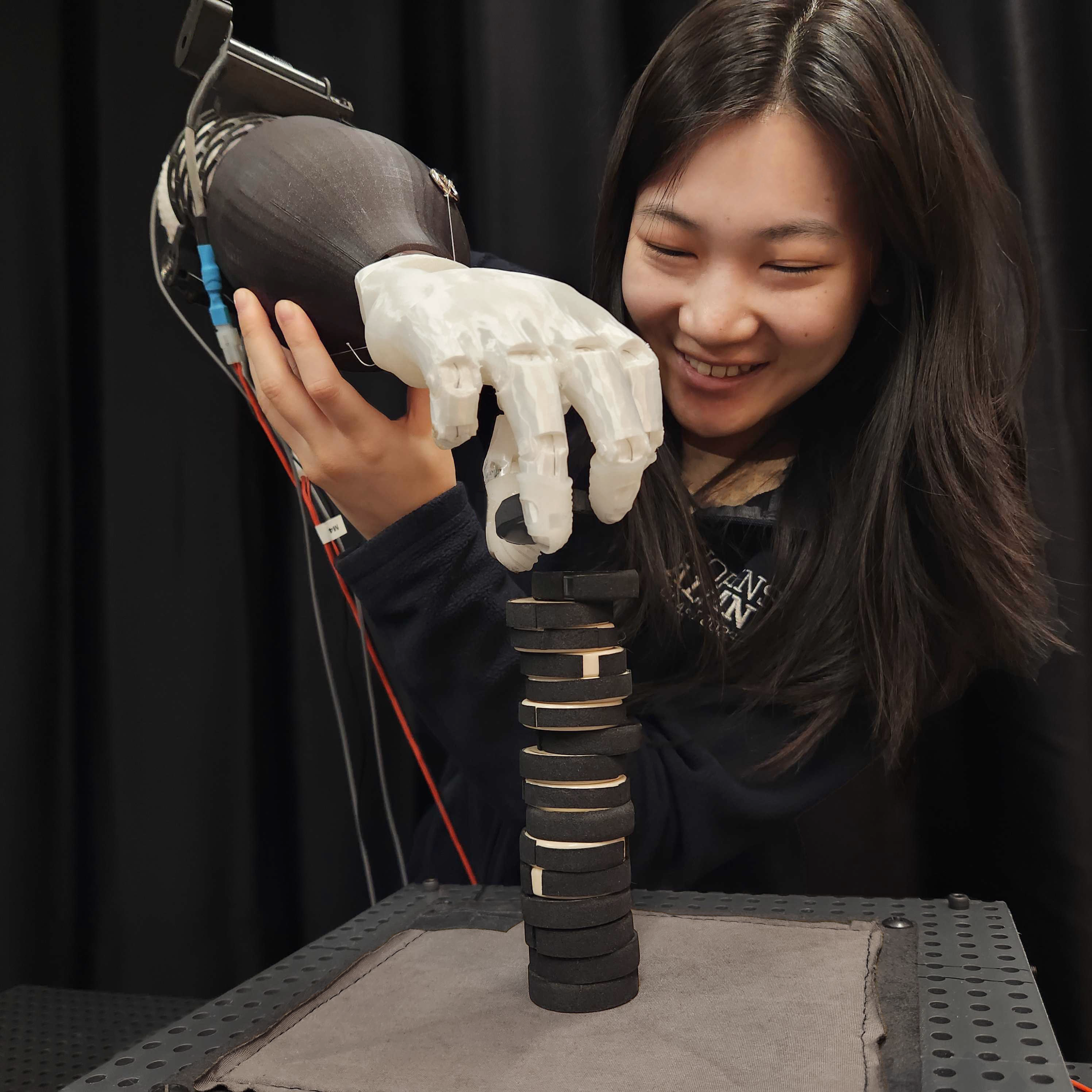 Tendon-actuated prosthetic hand